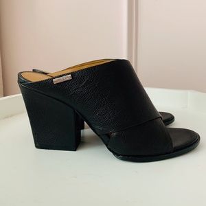 Black Calvin Klein Leather Heel Slip Ons